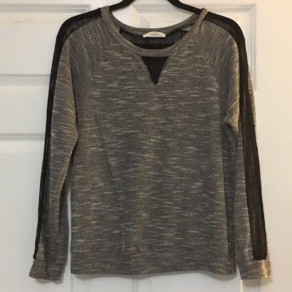 Gray and Black knitted sweater.